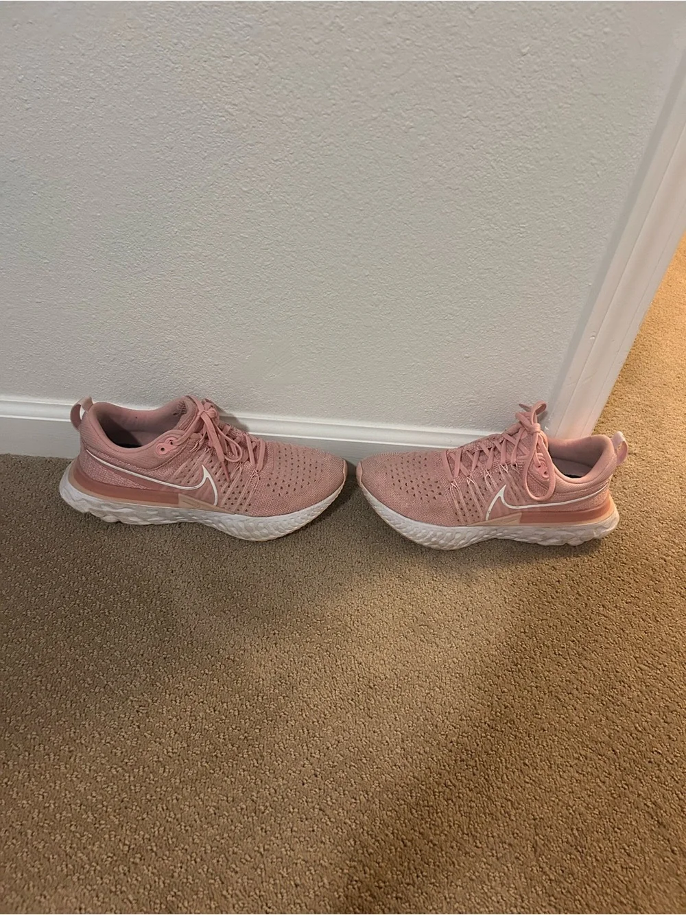 Nike Women's React Infinity Run Flyknit 2 Running Shoes in Pink Glaze